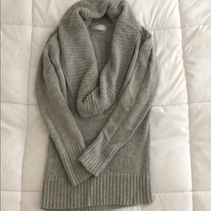 Grey cowl neck sweater.